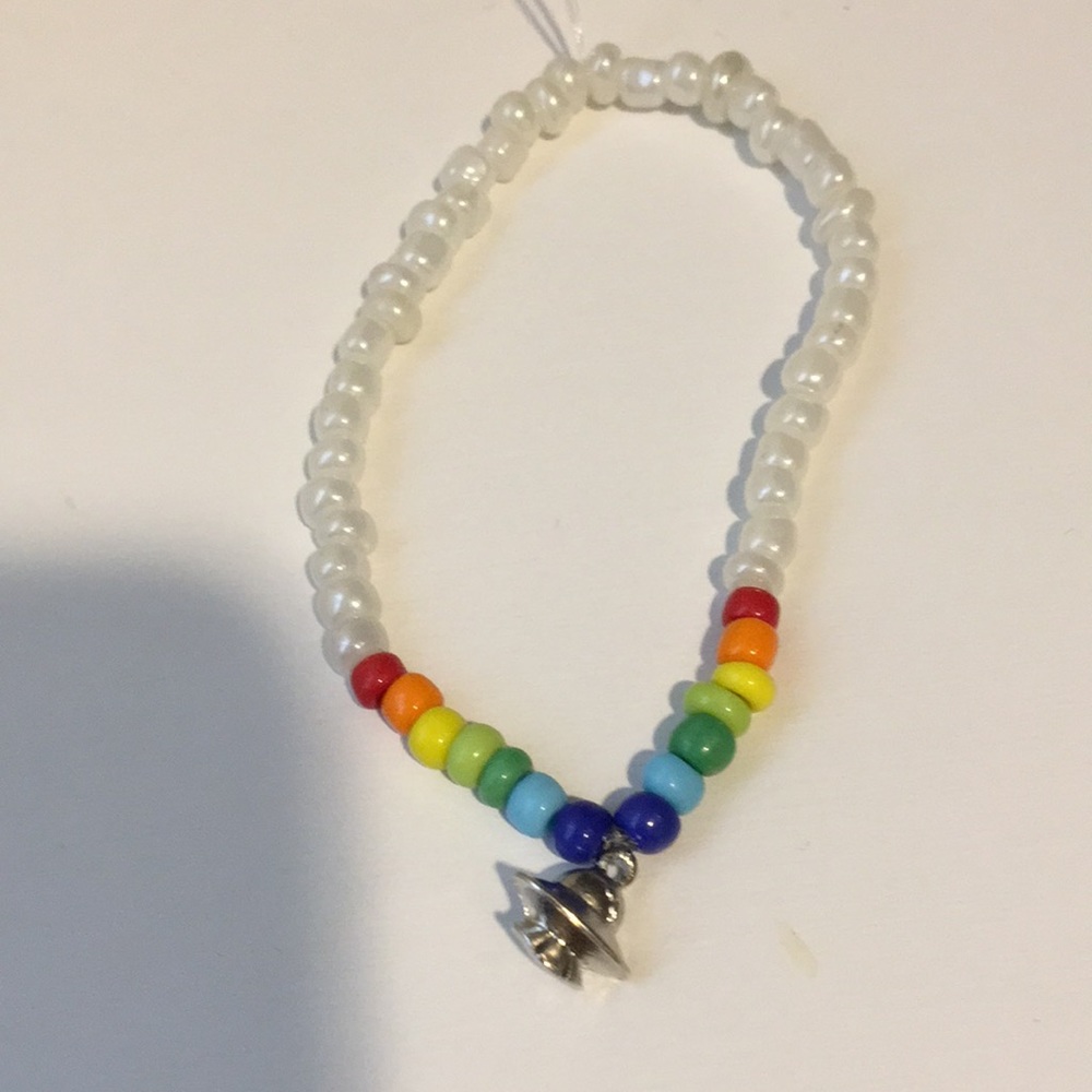 White braclet  and silver alien spaceship